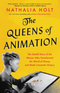 Cover of The Queens of Animation by Nathalia Hold. A woman colors in an animation cell with deer on it.